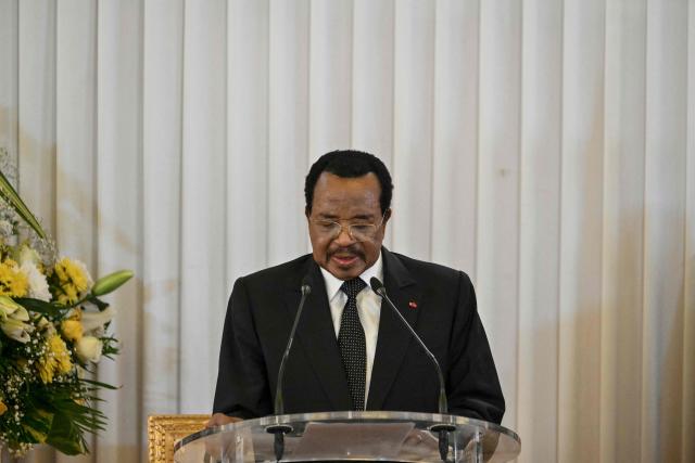 Cameroon's President Paul Biya delivers a speech with Pope Leo XIV (unseen) in attendance at The Presidential Palace in Yaounde, on the third day of an 11-day apostolic journey to Africa, on April 15, 2026. (Photo by Alberto PIZZOLI / AFP)