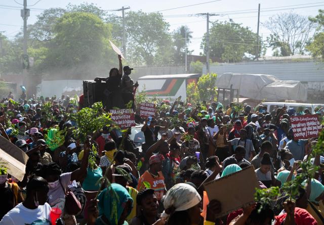 Protestors rally against rising fuel prices in Port-au-Prince, Haiti, on April 15, 2026. Workers say that fuel prices should not exceed their minimum wage. Crude prices climbed Wednesday while stocks diverged as investors digested mixed signals about talks to end the war in the Middle East and get oil and gas flowing through the Strait of Hormuz once again. (Photo by Clarens SIFFROY / AFP)