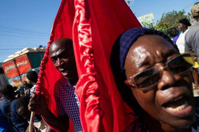 Protestors rally against rising fuel prices in Port-au-Prince, Haiti, on April 15, 2026. Workers say that fuel prices should not exceed their minimum wage. Crude prices climbed Wednesday while stocks diverged as investors digested mixed signals about talks to end the war in the Middle East and get oil and gas flowing through the Strait of Hormuz once again. (Photo by Clarens SIFFROY / AFP)