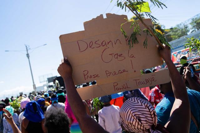 Protestors rally against rising fuel prices in Port-au-Prince, Haiti, on April 15, 2026. Workers say that fuel prices should not exceed their minimum wage. Crude prices climbed Wednesday while stocks diverged as investors digested mixed signals about talks to end the war in the Middle East and get oil and gas flowing through the Strait of Hormuz once again. (Photo by Clarens SIFFROY / AFP)