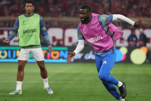 Real Madrid's German defender #22 Antonio Ruediger runs during warm-up prior to the start of the UEFA Champions League quarter-final second leg football match between FC Bayern Munich and Real Madrid in Munich, southern Germany, on April 15, 2026. (Photo by Karl-Josef HILDENBRAND / AFP)