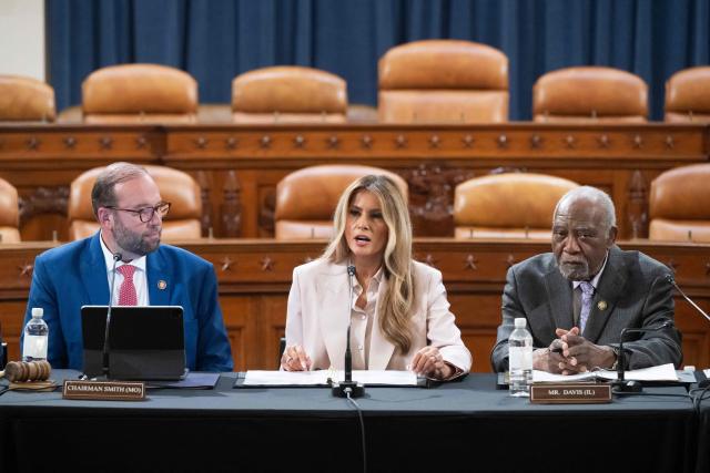 US First Lady Melania Trump speaks alongside committee Chairman Representative Jason Smith (L), Republican of Missouri, and Representative Danny Davis (R), Democrat of Illinois, during a House Ways and Means Committee roundtable discussion on advancing legislation protecting American foster care children, her second major legislative initiative of the second Trump administration, on Capitol Hill in Washington, DC, April 15, 2026. (Photo by SAUL LOEB / AFP)