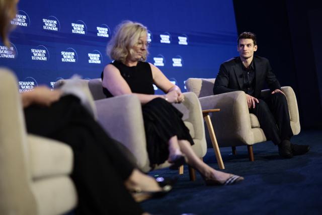 Zach Reitano (R), CEO & Co-Founder of Ro, and Wendy Barnes, President & CEO of GoodRx, speak during the 2026 Semafor World Economy conference in Washington, DC, on April 15, 2026. (Photo by Kent NISHIMURA / AFP)