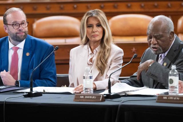 US First Lady Melania Trump listens alongside committee Chairman Representative Jason Smith (L), Republican of Missouri, as Representative Danny Davis (R), Democrat of Illinois, speaks during a House Ways and Means Committee roundtable discussion on advancing legislation protecting American foster care children, her second major legislative initiative of the second Trump administration, on Capitol Hill in Washington, DC, April 15, 2026. (Photo by SAUL LOEB / AFP)