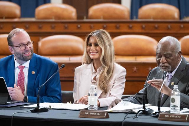 US First Lady Melania Trump listens alongside committee Chairman Representative Jason Smith (L), Republican of Missouri, as Representative Danny Davis (R), Democrat of Illinois, speaks during a House Ways and Means Committee roundtable discussion on advancing legislation protecting American foster care children, her second major legislative initiative of the second Trump administration, on Capitol Hill in Washington, DC, April 15, 2026. (Photo by SAUL LOEB / AFP)