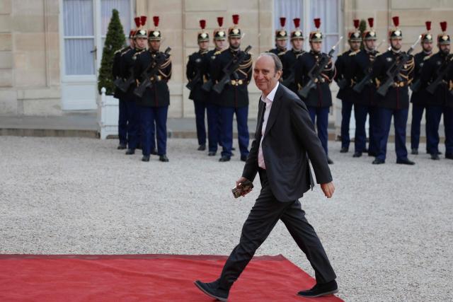 CEO of telecoms giant Iliad, the parent company of Free Telecoms, Xavier  Niel arrives at a state banquet held in honour of Mauritania's President at the Elysee Presidential Palace in Paris on April 15, 2026. (Photo by Ludovic MARIN / AFP)