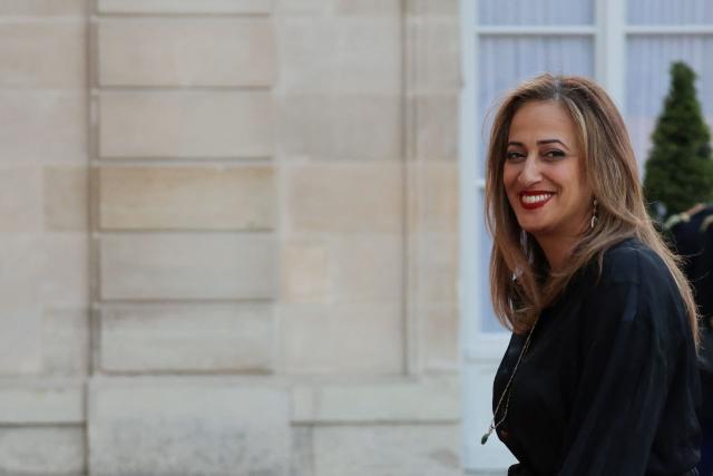 Ensemble Pour la Republique's MP Amelia Lakrafi arrives at a state banquet held in honour of Mauritania's President at the Elysee Presidential Palace in Paris on April 15, 2026. (Photo by Ludovic MARIN / AFP)