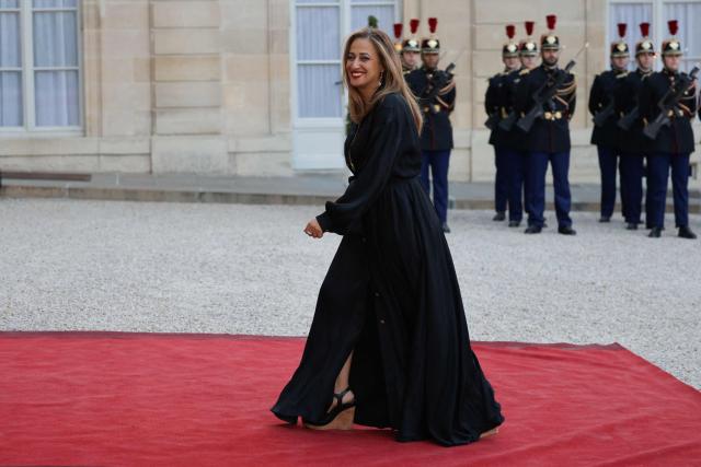 Ensemble Pour la Republique's MP Amelia Lakrafi arrives at a state banquet held in honour of Mauritania's President at the Elysee Presidential Palace in Paris on April 15, 2026. (Photo by Ludovic MARIN / AFP)