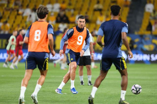 Nassr's Portuguese forward #07 Cristiano Ronaldo (C) warms up during the Saudi Pro League football match between Al-Nassr and Al-Ettifaq at the Al-Awwal Park Stadium in Riyadh on April 15, 2026. (Photo by Fayez Nureldine / AFP)