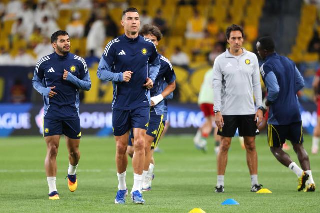 Nassr's Portuguese forward #07 Cristiano Ronaldo (C) warms up during the Saudi Pro League football match between Al-Nassr and Al-Ettifaq at the Al-Awwal Park Stadium in Riyadh on April 15, 2026. (Photo by Fayez Nureldine / AFP)