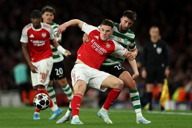 Arsenal's Swedish striker #14 Viktor Gyokeres is put under pressure by Sporting Lisbon's Portuguese defender #25 Goncalo Inacio during the UEFA Champions League quarter-final, second-leg football match between Arsenal and Sporting Lisbon at the Emirates Stadium in north London on April 15, 2026. (Photo by Adrian Dennis / AFP)