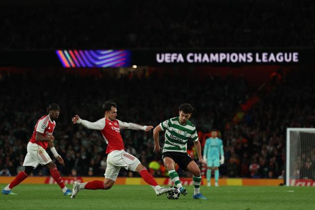 Arsenal's Spanish defender #36 Martin Zubimendi stretches for the ball during the UEFA Champions League quarter-final, second-leg football match between Arsenal and Sporting Lisbon at the Emirates Stadium in north London on April 15, 2026. (Photo by Adrian Dennis / AFP)