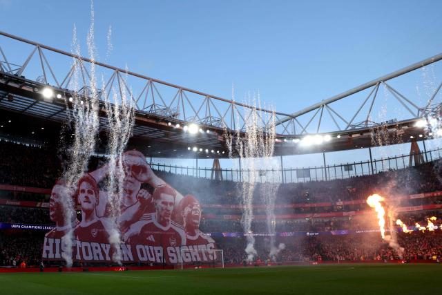 A tifo is displayed before the UEFA Champions League quarter-final, second-leg football match between Arsenal and Sporting Lisbon at the Emirates Stadium in north London on April 15, 2026. (Photo by Adrian DENNIS / AFP)