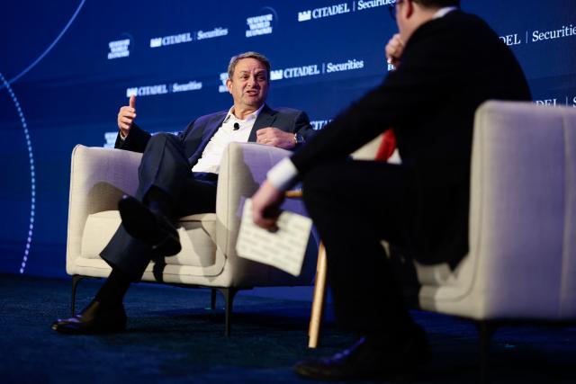 Marcus Lazarus (L), CEO of VERSANT speaks during the 2026 Semafor World Economy conference in Washington, DC, on April 15, 2026. (Photo by Kent NISHIMURA / AFP)