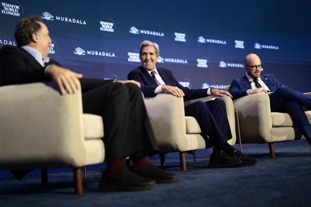 Former US Secretary of State John Kerry (C) speaks as Larry Coben (L), chair and CEO of NRG Energy, and Semafor Climate and Energy Editor Tim McDonnell look on during the 2026 Semafor World Economy conference in Washington, DC, on April 15, 2026. (Photo by Kent NISHIMURA / AFP)
