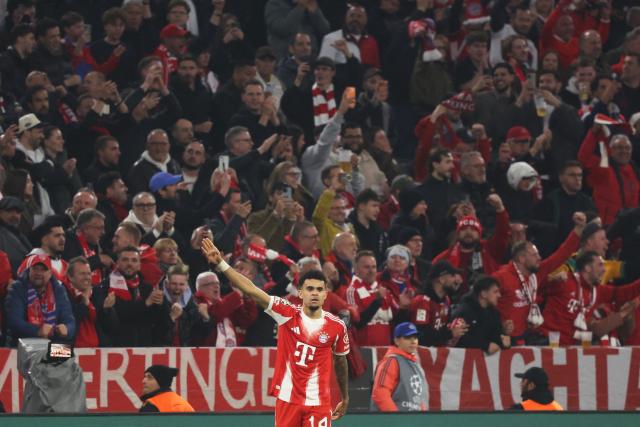 Bayern Munich's Colombian forward #14 Luis Diaz celebrates after scoring the equalizing 3-3 goal during the UEFA Champions League quarter-final second leg football match between FC Bayern Munich and Real Madrid in Munich, southern Germany, on April 15, 2026. (Photo by Karl-Josef HILDENBRAND / AFP)