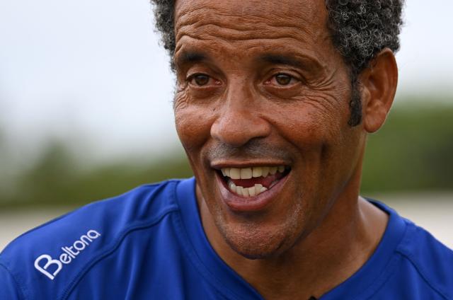 Dutch-Curacaoan former football player and manager Remko Bicentini, of the Stichting Bicentini Foundation, speaks during an interview with AFP in Willemstad, Curacao, in the Dutch Caribbean, on April 8, 2026. Small island, big dreams. The poster of Curacao’s national football team hangs at the entrance of Marchena, a working-class neighborhood of Willemstad, the capital of the smallest territory ever to qualify for a World Cup. (Photo by Raul ARBOLEDA / AFP)