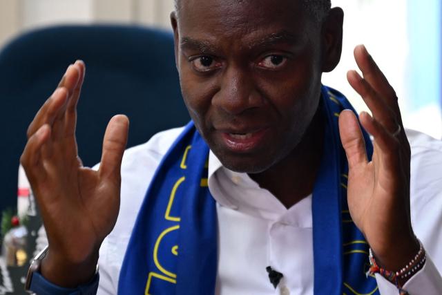 Gilbert Martina, President of the Curacao Football Federation, speaks with AFP during an interview in Willemstad, Curacao, in the Dutch Caribbean, on April 8, 2026. Small island, big dreams. The poster of Curacao’s national football team hangs at the entrance of Marchena, a working-class neighborhood of Willemstad, the capital of the smallest territory ever to qualify for a World Cup. (Photo by Raul ARBOLEDA / AFP)