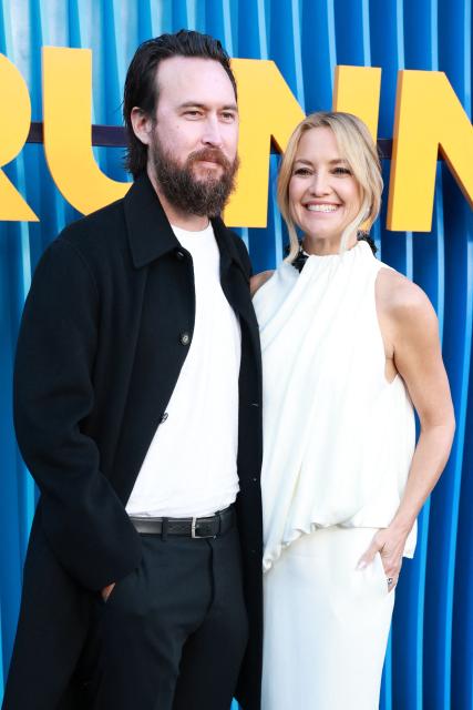 US actress Kate Hudson (R) and partner US musician Danny Fujikawa attend the premiere of Netflix's "Running Point," Season 2, at the Egyptian Theatre in Hollywood on April 15, 2026. (Photo by Patrick T. Fallon / AFP)
