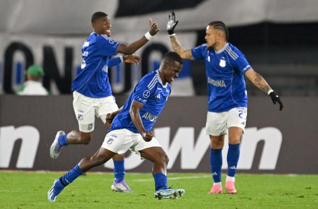 Millonarios' midfielder #07 Darwin Quintero celebrates after scoring the opening goal during the Copa Sudamericana group stage football match between Colombia's Millonarios and Uruguay's Boston River at the Nemesio Camacho El Campin Stadium in Bogota on April 15, 2026. (Photo by Raul ARBOLEDA / AFP)