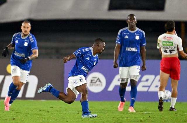Millonarios' midfielder #07 Darwin Quintero celebrates after scoring the opening goal during the Copa Sudamericana group stage football match between Colombia's Millonarios and Uruguay's Boston River at the Nemesio Camacho El Campin Stadium in Bogota on April 15, 2026. (Photo by Raul ARBOLEDA / AFP)