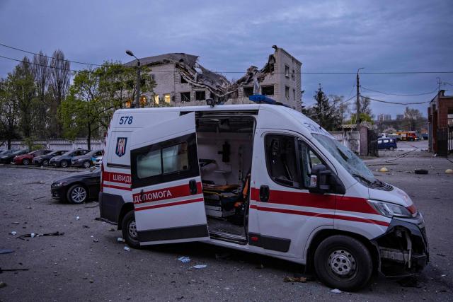 A damaged ambulance is seen following a Russian strike in Kyiv on April 16, 2026, amid the Russian invasion of Ukraine. Russian strikes killed at least 12 people in Ukraine, local authorities said on April 16, after Moscow pummelled its neighbour in overnight attacks. (Photo by Serhii Okunev / AFP)