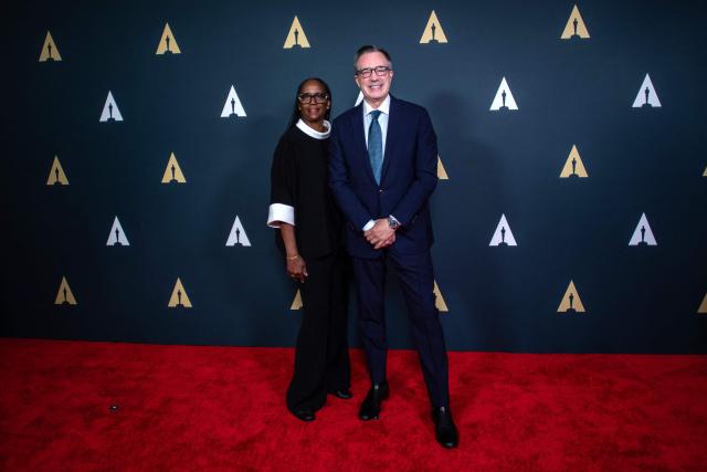 Academy Foundation Board President & Nicholl Committee Co-Chair, Kim Taylor-Coleman (L) and Academy of Motion Picture Arts and Sciences CEO Bill Kramer attend the Academy Nicholl Fellowships in Screenwriting ceremony at the Beverly Hills Hotel in Beverly Hills, California, on April 15, 2026. (Photo by Apu GOMES / AFP)