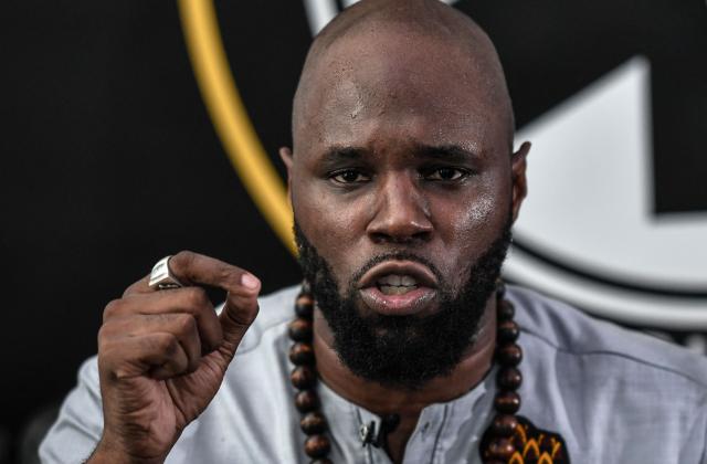 (FILES) French anti-colonial activist Kemi Seba  addresses a press conference on June 26, 2020 in Paris. Police in South Africa said Thursday they had arrested anti-Western activist Kemi Seba wanted in Benin for "inciting rebellion" after he supported a foiled coup in December.
Preparations were being made for Seba's extradition after his arrest with his son on April 13, 2026 the police said in a statement. 
Seba, whose real name is Stellio Gilles Robert Capo Chichi, heads the NGO Pan-Africanist Emergency and is known for his radical tirades against France and African governments allied with Paris. (Photo by STEPHANE DE SAKUTIN / AFP)