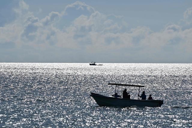 Fishing boats are moored along the coast at Trincomalee on April 16, 2026. (Photo by Ishara S. KODIKARA / AFP)