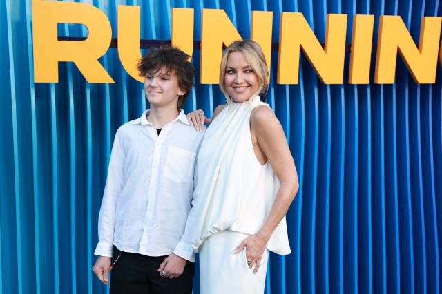 US actress Kate Hudson (R) and her son Bingham Hawn Bellamy attend the premiere of Netflix's "Running Point," Season 2, at the Egyptian Theatre in Hollywood on April 15, 2026. (Photo by Patrick T. Fallon / AFP)