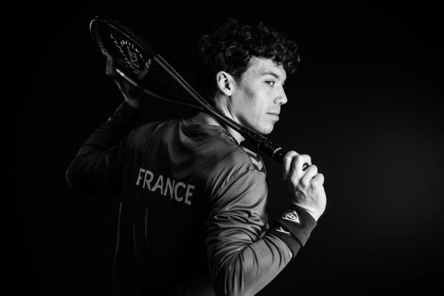French squash player Victor Crouin poses during a photo session in Paris on April 16, 2026. (Photo by JULIEN DE ROSA / AFP)