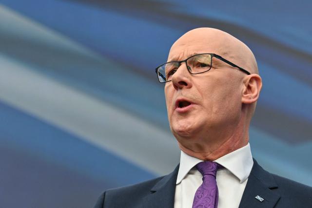 Scotland's First Minister and Scottish National Party (SNP) leader John Swinney takes part in the launch the SNP's 2026 Scottish Parliament election manifesto in Glasgow on April 16, 2026. (Photo by ANDY BUCHANAN / AFP)
