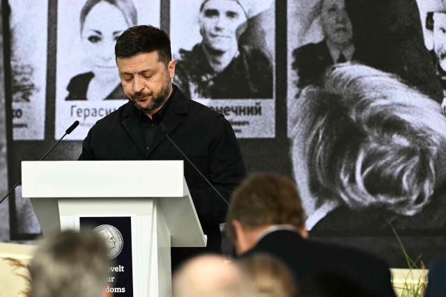 Ukraine's President Volodymyr Zelensky delivers observes a minute’s silence after receiving the International Four Freedoms Award during the Roosevelt Foundation's International Four Freedoms Awards ceremony in Middelburg on April 16, 2026. (Photo by NICOLAS TUCAT / AFP)