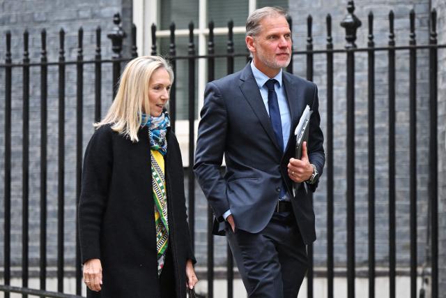 Kate Alessi (L), vice president and managing director for Google UK and Ireland, and Markus Reinisch, vice president for public policy in Europe at Meta, leave following a meeting with Britain's Prime Minister Keir Starmer to discuss child safety online, at Downing Street in central London on April 16, 2026. (Photo by Leon Neal / POOL / AFP)
