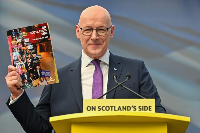 Scotland's First Minister and Scottish National Party (SNP) leader John Swinney takes part in the launch the SNP's 2026 Scottish Parliament election manifesto in Glasgow on April 16, 2026. (Photo by ANDY BUCHANAN / AFP)