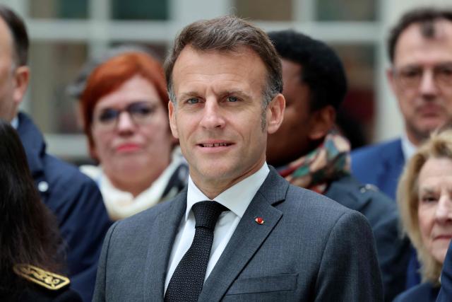 France's President Emmanuel Macron looks on during his visit to the International City of French Language (Cite Internationale de la Langue Francaise) to promote 'disconnecting' and 'reading' as alternatives to screens as part of his fight to ban social networks for the youngest in the castle of Villers-Cotterets, northern France on April 16, 2026. In response to the explosion in screen time among 6- to 17-year-olds and the impact of algorithms on our children, Emmanuel Macron has pledged to ban social media for those under 15. (Photo by Ludovic MARIN / POOL / AFP)