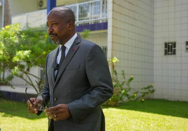 (FILES) Gabon's opposition leader Alain-Claude Bilie-By-Nze arrives to speak at a press conference at the Tahiti Hotel in Libreville on April 14, 2025 after the country's presidential elections. Gabon authorities have arrested the country's main opposition leader Alain-Claude Bilie-By-Nze, his political party said on April 16, 2026.
Bilie-By-Nze was detained at his home on April 15, 2026, his Together For Gabon (EPG) party said, adding that it was carried out in "conditions that we consider arbitrary, brutal and manifestly contrary to the fundamental principles of the rule of law." (Photo by Nao Mukadi / AFP)