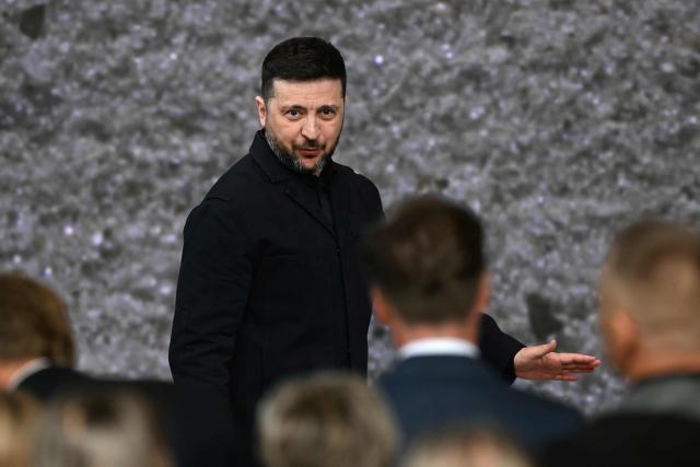 Ukraine's President Volodymyr Zelensky thanks attendees after receiving the International Four Freedoms Award during the Roosevelt Foundation's International Four Freedoms Awards ceremony in Middelburg on April 16, 2026. (Photo by NICOLAS TUCAT / AFP)