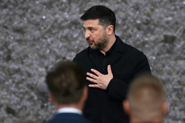 Ukraine's President Volodymyr Zelensky thanks attendees after receiving the International Four Freedoms Award during the Roosevelt Foundation's International Four Freedoms Awards ceremony in Middelburg on April 16, 2026. (Photo by NICOLAS TUCAT / AFP)