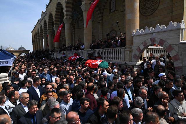 Family members and mourners attend the funerals for nine victims killed in a school shooting by a 14-year-old, an attack that has sent shockwaves across the country, with authorities saying the suspect had referenced a US mass killer in a WhatsApp profile image, at the Abdulhamid Han Mosque in the southern province of Kahramanmaras on April 16, 2026. The funerals take place for eight children aged 10 and 11 and a 55-year-old teacher. (Photo by YASIN AKGUL / AFP)