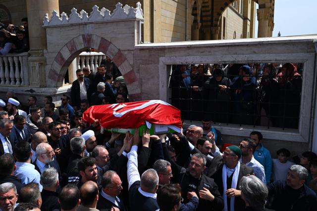 Family members and mourners attend the funerals for nine victims killed in a school shooting by a 14-year-old, an attack that has sent shockwaves across the country, with authorities saying the suspect had referenced a US mass killer in a WhatsApp profile image, in the southern province of Kahramanmaras on April 16, 2026. The funerals take place for eight children aged 10 and 11 and a 55-year-old teacher. (Photo by YASIN AKGUL / AFP)