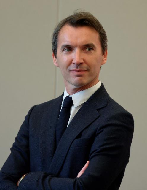 Clement Hervieu-Leger, head of the Comedie-Francaise, looks on during a visit to the International City of French Language (Cite Internationale de la Langue Francaise) to promote 'disconnecting' and 'reading' as alternatives to screens as part of his fight to ban social networks for the youngest in the castle of Villers-Cotterets, northern France on April 16, 2026. In response to the explosion in screen time among 6- to 17-year-olds and the impact of algorithms on our children, Emmanuel Macron has pledged to ban social media for those under 15. (Photo by Ludovic MARIN / POOL / AFP)