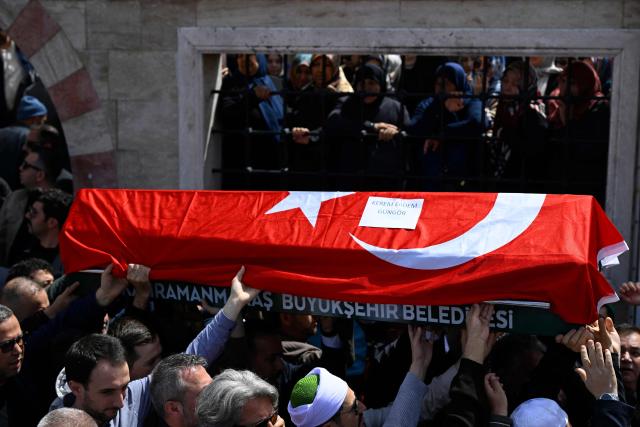 Family members and mourners carry the coffin of 10-year-old Kerem Erdem Güngör as they dattend the funerals for nine victims killed in a school shooting by a 14-year-old, an attack that has sent shockwaves across the country, with authorities saying the suspect had referenced a US mass killer in a WhatsApp profile image, in the southern province of Kahramanmaras on April 16, 2026. The funerals take place for eight children aged 10 and 11 and a 55-year-old teacher. (Photo by YASIN AKGUL / AFP)