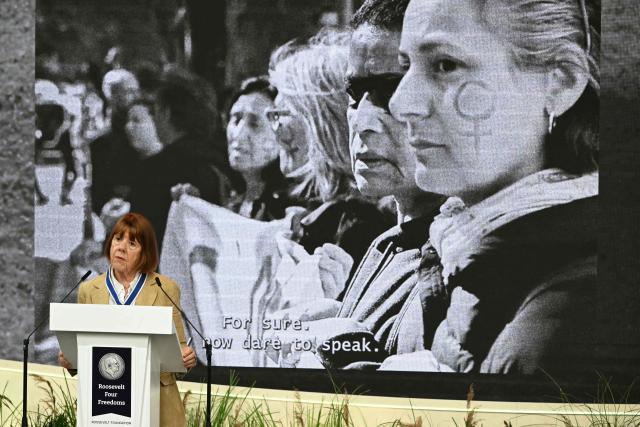 Frenchwoman Gisèle Pelicot, whose husband was convicted in 2024 of drugging her and letting scores of men rape her while unconscious, delivers a speech after receiving the Freedom from Fear award during the Roosevelt Foundation's International Four Freedoms Awards ceremony in Middelburg on April 16, 2026. (Photo by NICOLAS TUCAT / AFP)