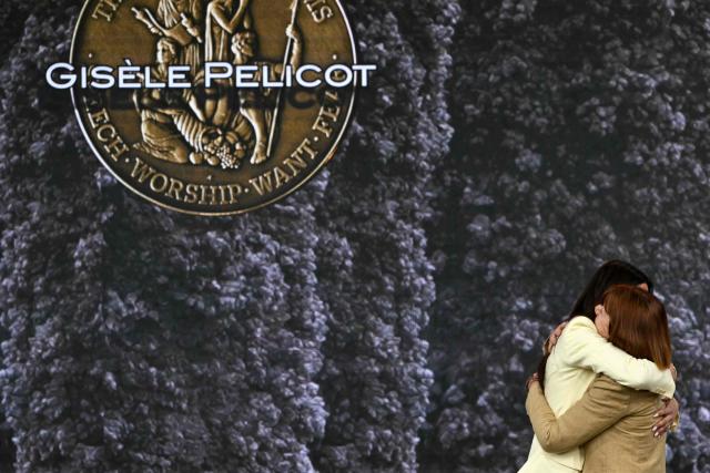 Frenchwoman Gisèle Pelicot, whose husband was convicted in 2024 of drugging her and letting scores of men rape her while unconscious, receives from the hand of Dutch fashion designer and entrepreneur Olcay Gulsen (L) the Freedom from Fear award during the Roosevelt Foundation's International Four Freedoms Awards ceremony in Middelburg on April 16, 2026. (Photo by NICOLAS TUCAT / AFP)