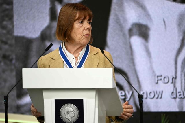 Frenchwoman Gisèle Pelicot, whose husband was convicted in 2024 of drugging her and letting scores of men rape her while unconscious, delivers a speech after receiving the Freedom from Fear award during the Roosevelt Foundation's International Four Freedoms Awards ceremony in Middelburg on April 16, 2026. (Photo by NICOLAS TUCAT / AFP)