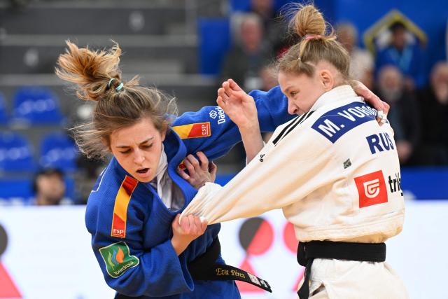 Russia's Marina Vorobeva (white) and Spain's Eva Perez Soler compete in the women's under 48 kg category bronze medal bout at the Judo European Senior Championships 2026 in Tbilisi on April 16, 2026. (Photo by Vano SHLAMOV / AFP)
