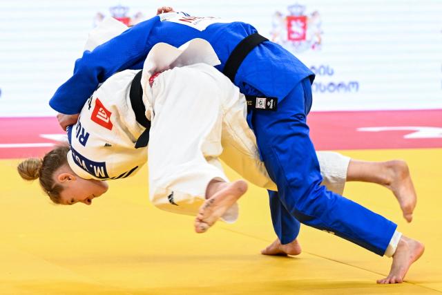 Russia's Marina Vorobeva (white) and Spain's Eva Perez Soler compete in the women's under 48 kg category bronze medal bout at the Judo European Senior Championships 2026 in Tbilisi on April 16, 2026. (Photo by Vano SHLAMOV / AFP)