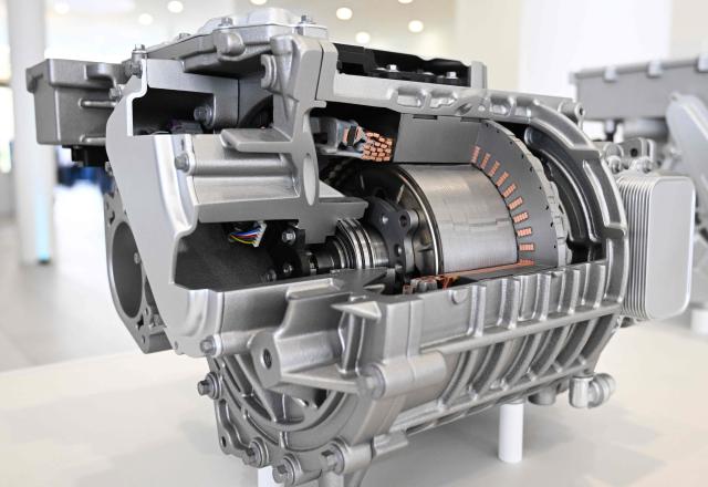 An eAxle system for electric vehicles of German technology company Bosch is shown during the annual press conference at the company’s research center in Renningen, southern Germany, on April 16, 2026. (Photo by THOMAS KIENZLE / AFP)