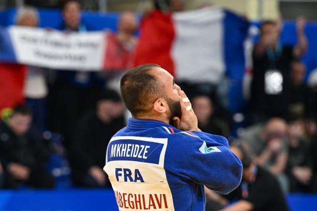 France's Luka Mkheidze wins against Georgia's Giorgi Sardalashvili in the men's under 60 kg category gold medal bout at the Judo European Senior Championships 2026 in Tbilisi on April 16, 2026. (Photo by Vano SHLAMOV / AFP)